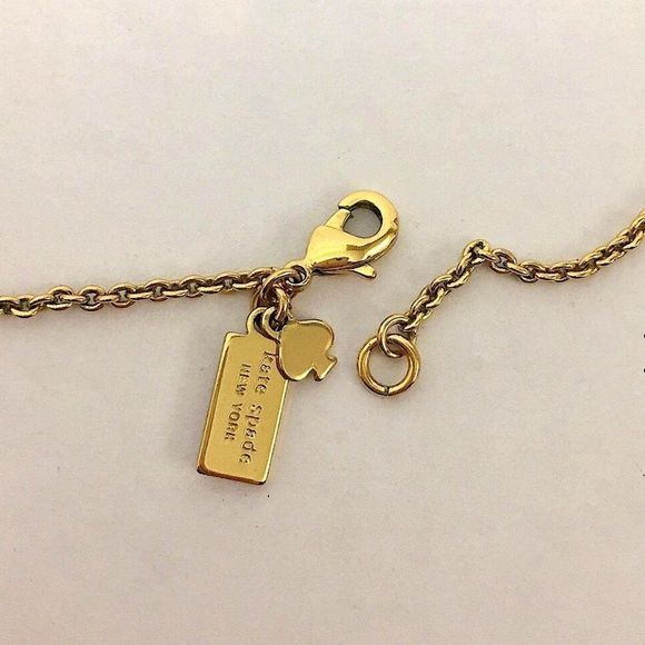 KATE SPADE Gold Tone Gold Enamel Bow Long Necklace - Picture 5 of 14